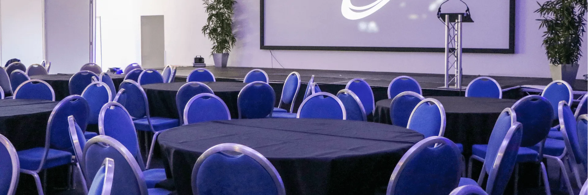 Events Meetings Venue, Tables and Chairs With a Stage