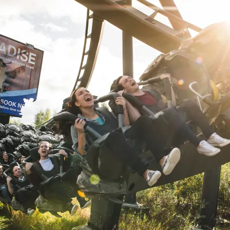 Close Up of guests on The Swarm Rollercoaster
