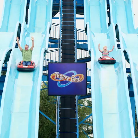 Guests coming down Depth Charge water slides